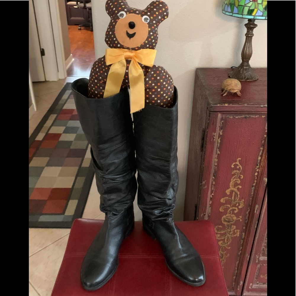Over the knee black leather boots